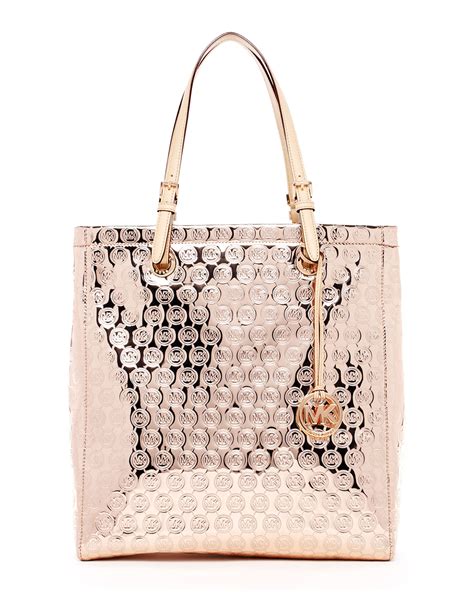 michael kors tote rose gold|Michael Kors large gold tote.